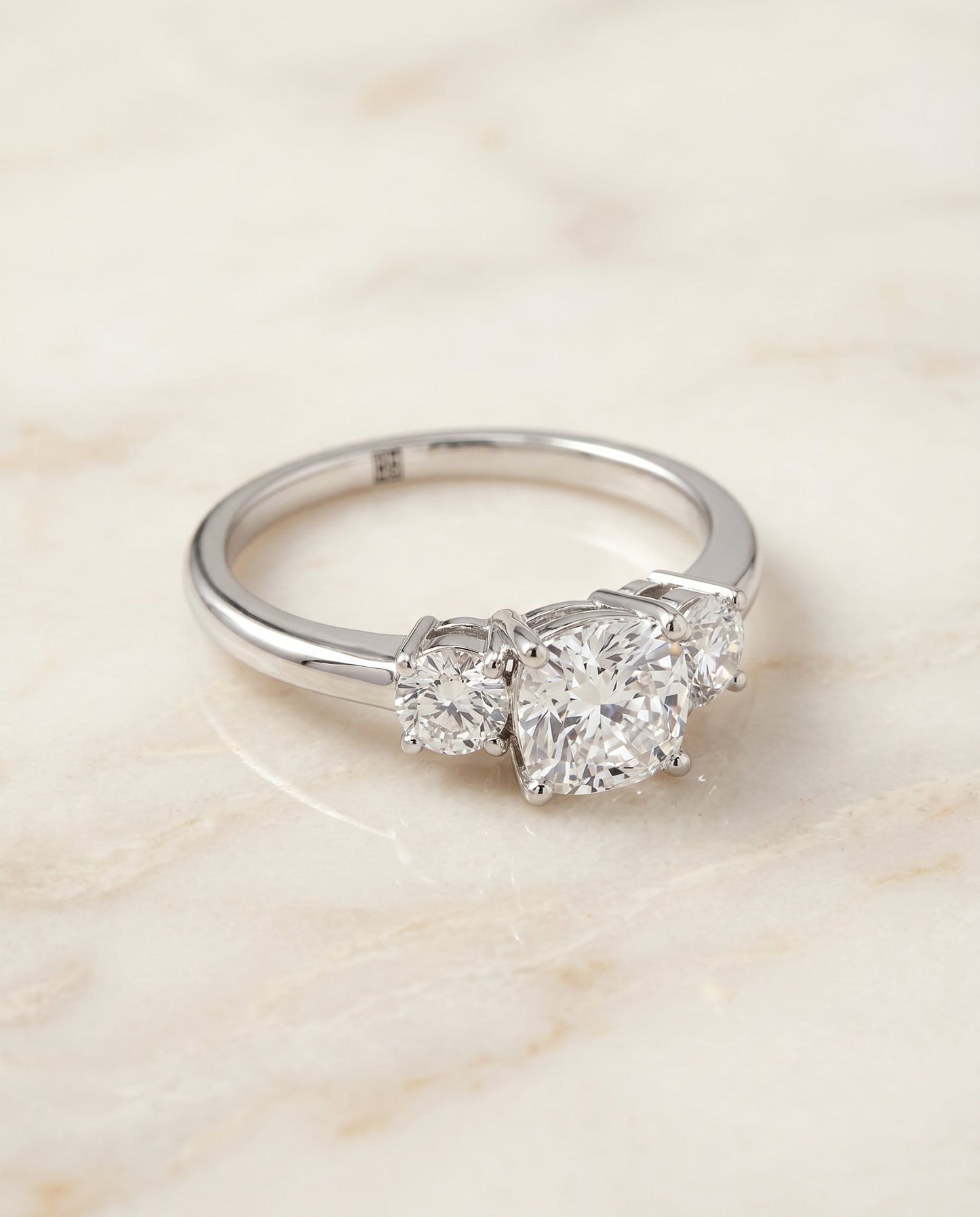 Anita Select Classic Three Stone Cushion Solitaire in Platinum – view 1