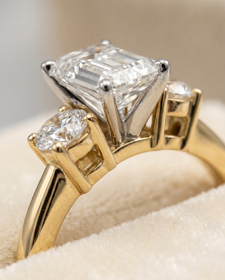 The Anita Three Stone Engagement Ring Setting for Emerald Cut Diamonds in 18K Yellow Gold