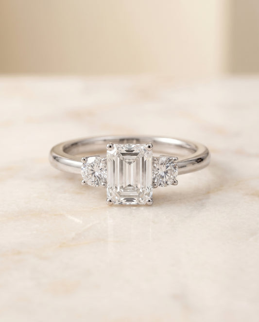The Anita Three Stone Engagement Ring Setting for Emerald Cut Diamonds in Platinum