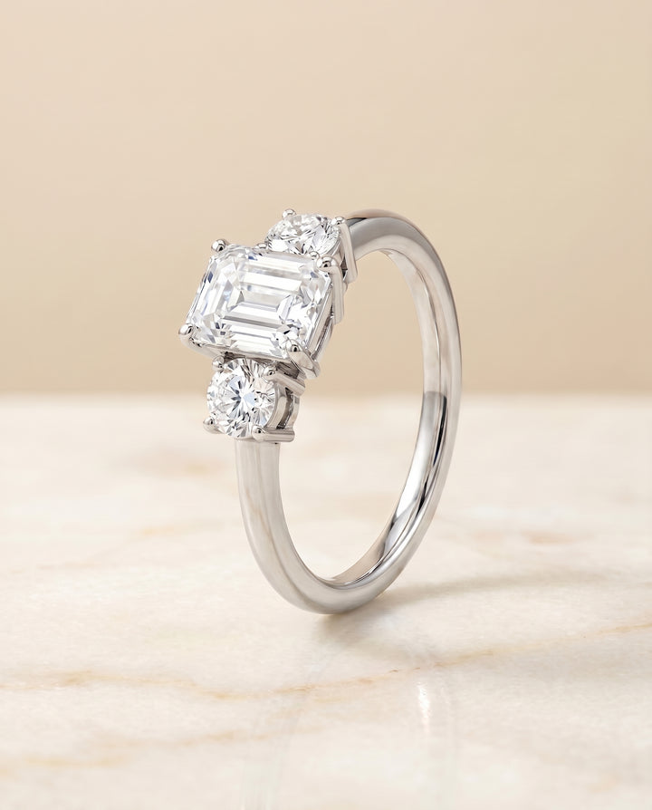 The Anita Three Stone Engagement Ring Setting for Emerald Cut Diamonds in 18K White Gold