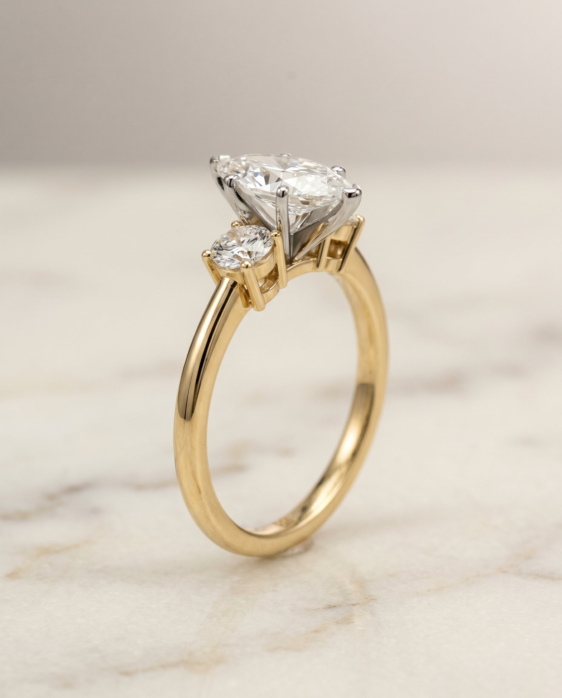 Classic Three Stone styling on The Anita marquise engagement ring setting | RockHer