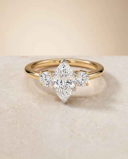 Anita Select Three Stone Marquise Lab Diamond Engagement Ring in 18K Yellow Gold, shown on hand, angled | RockHer
