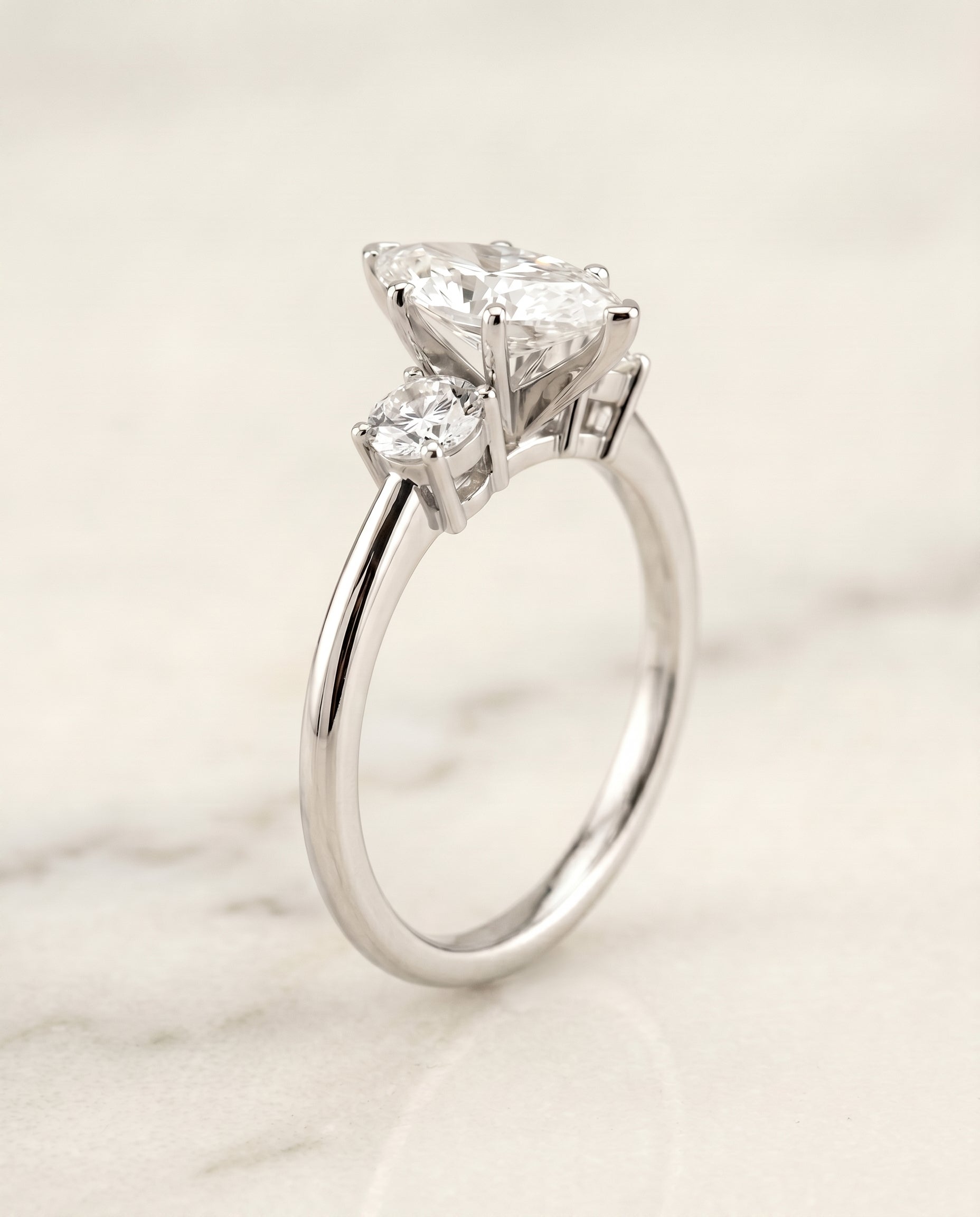 Classic Three Stone styling on The Anita marquise engagement ring setting | RockHer
