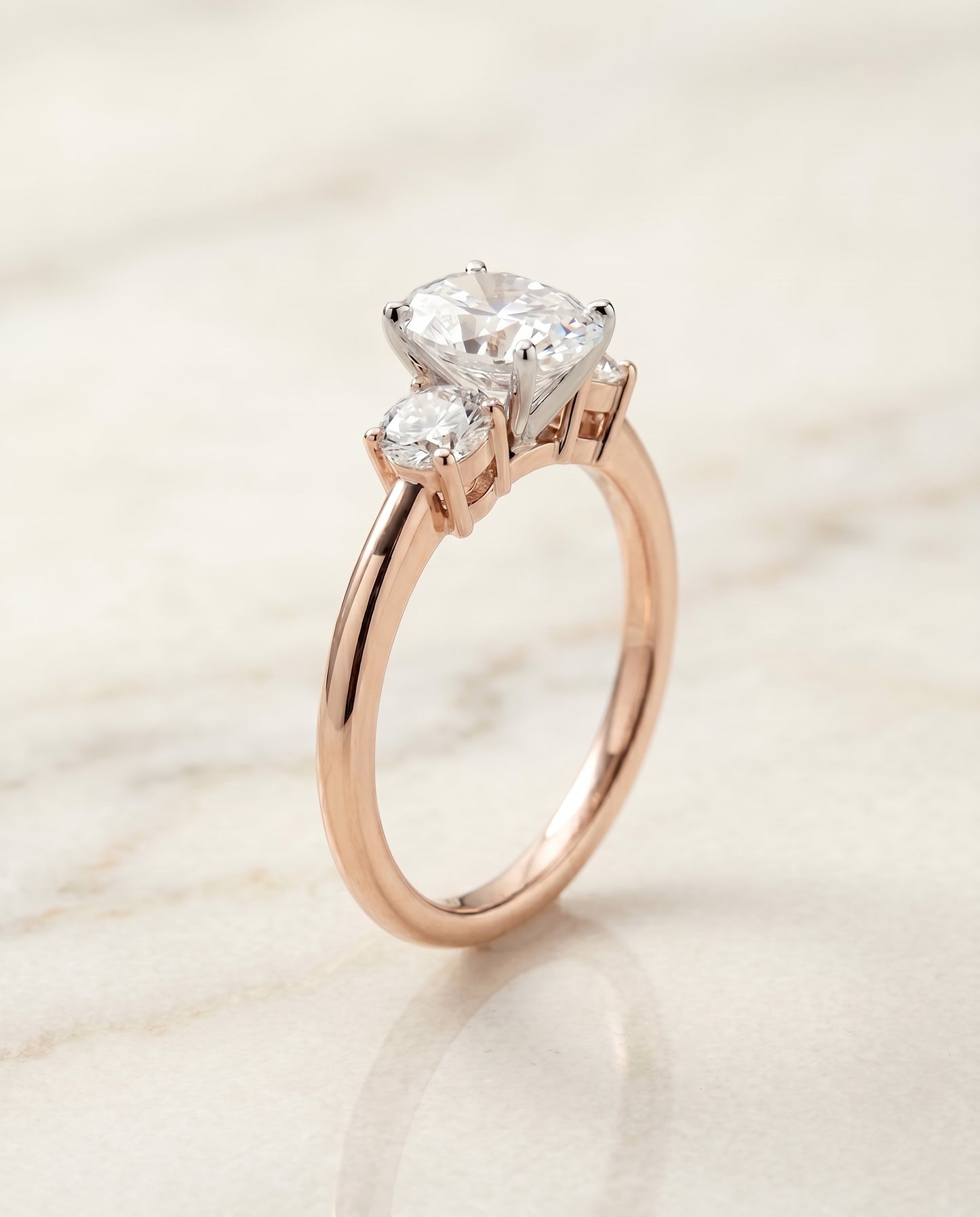 The Anita Three Stone Engagement Ring Setting for Oval Diamonds in 14K Rose Gold