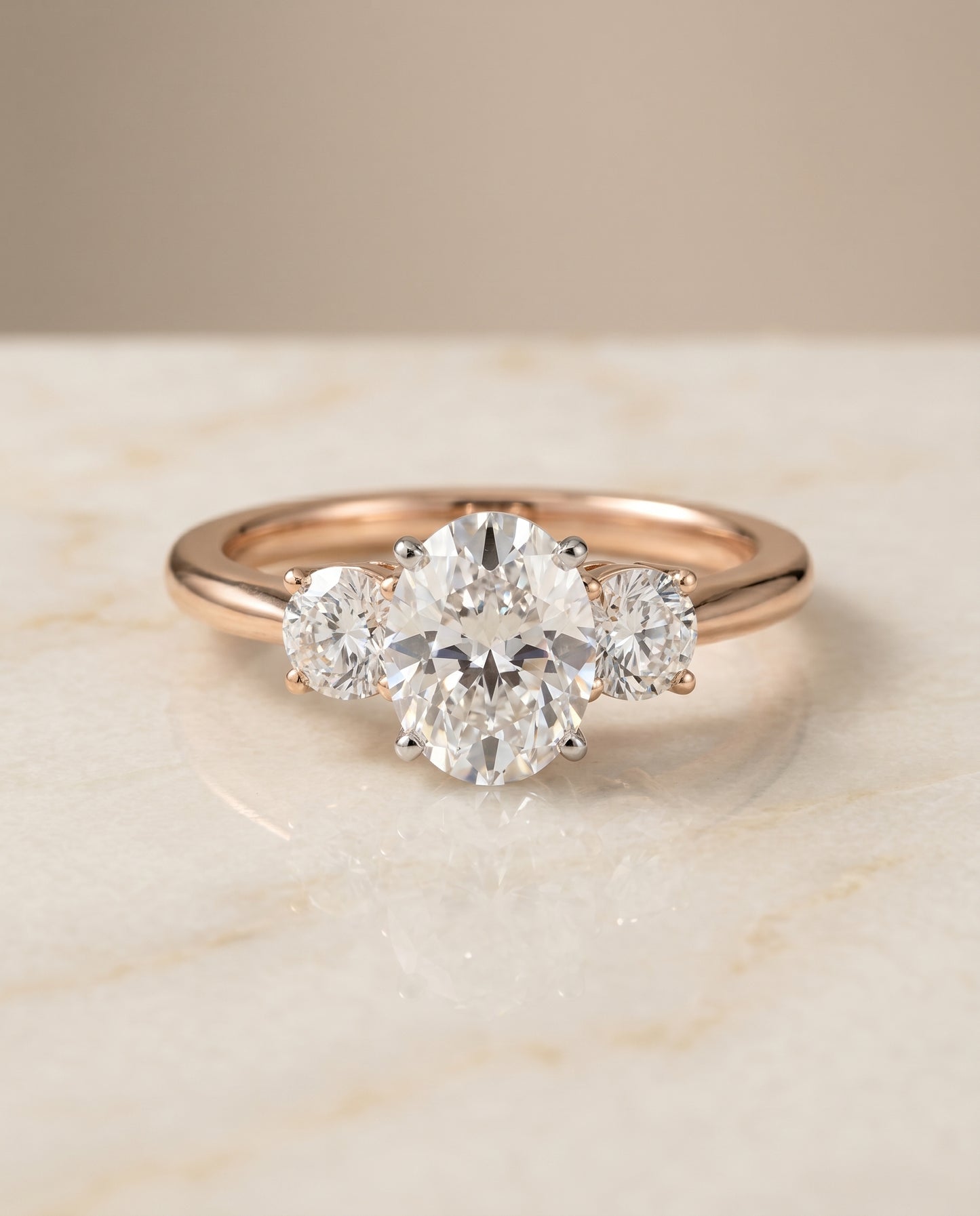 The Anita Three Stone Engagement Ring Setting for Oval Diamonds in 14K Rose Gold