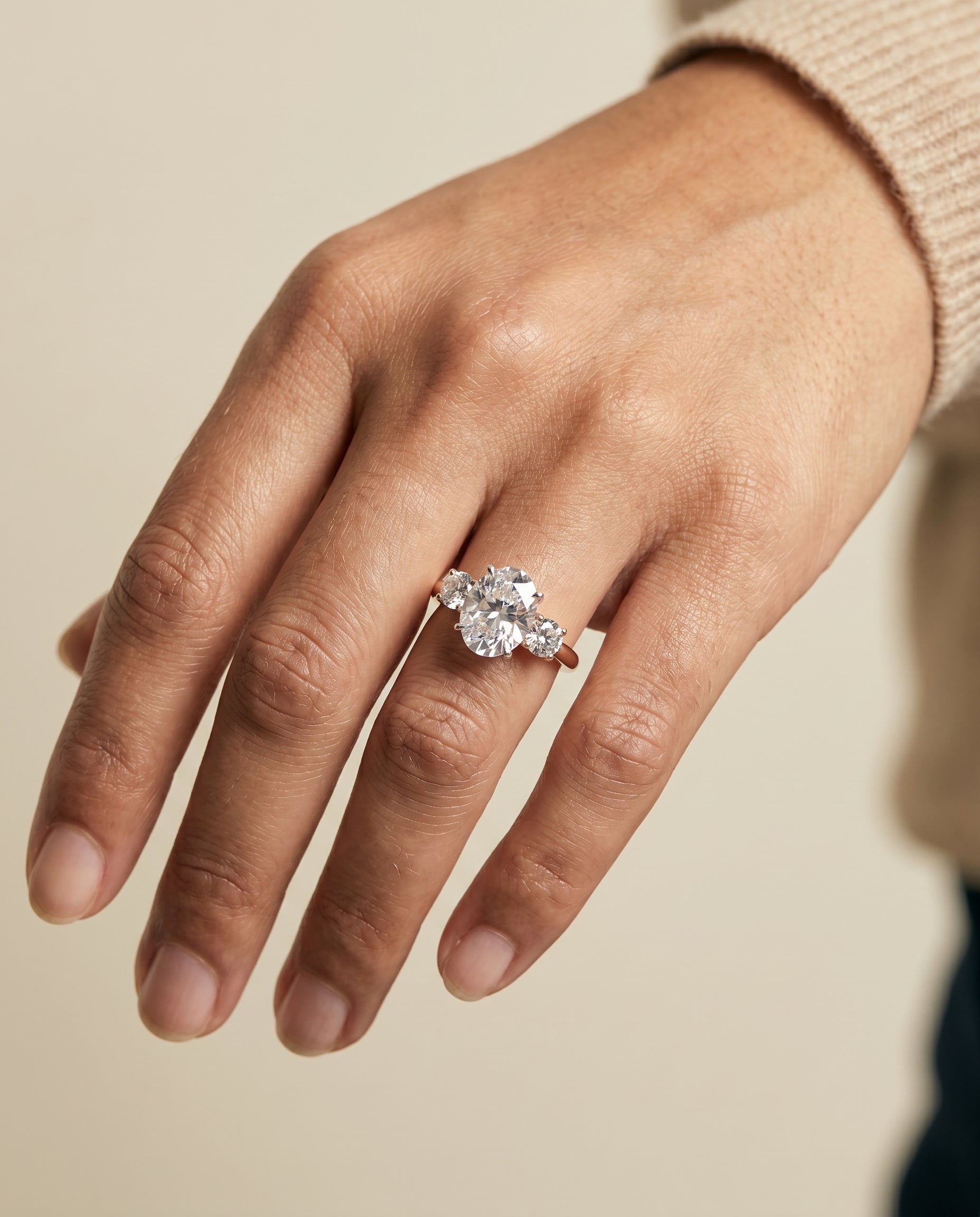 The Anita engagement ring setting in 14K Rose Gold, classic three stone design | RockHer