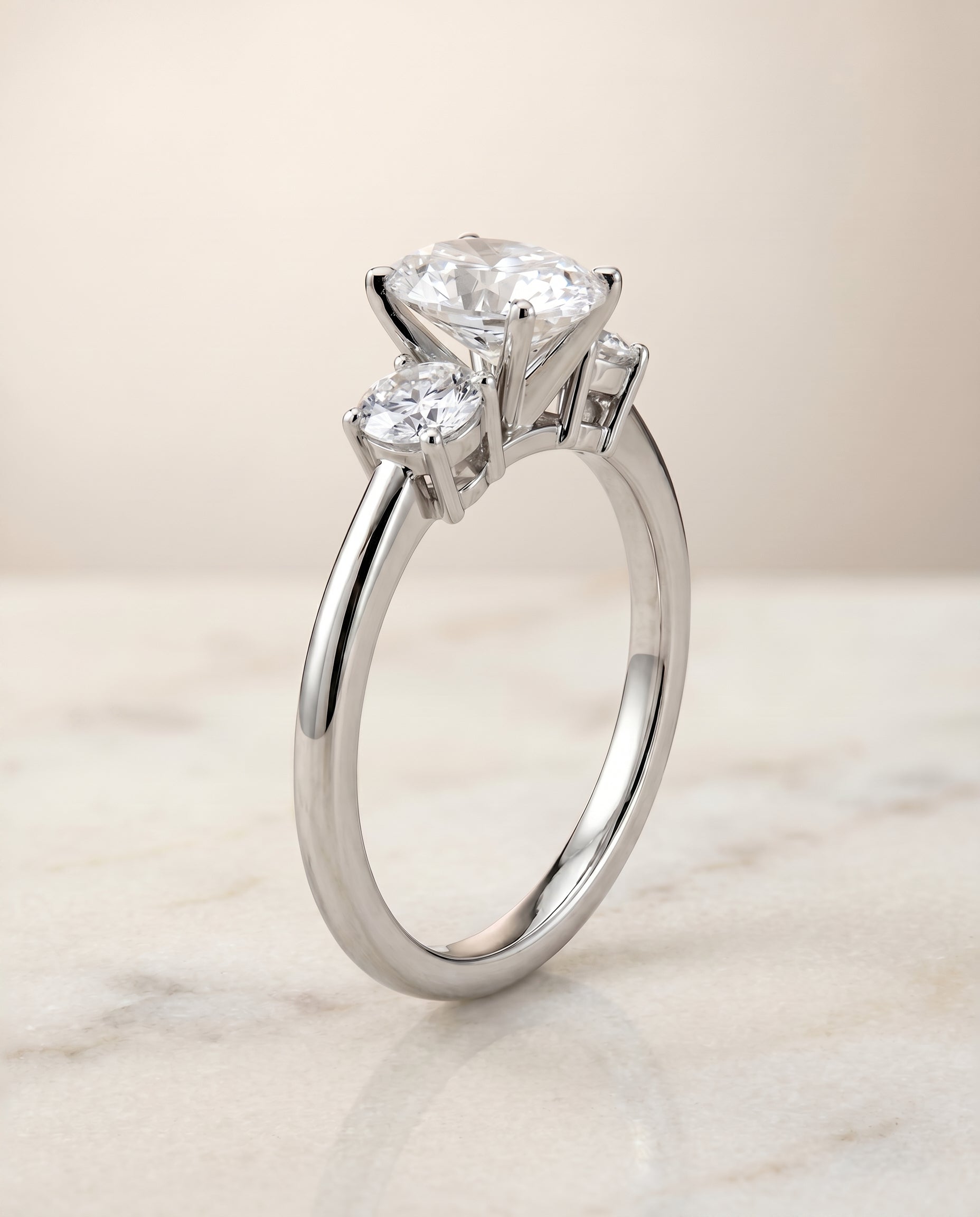 Classic Three Stone styling on The Anita oval engagement ring setting | RockHer
