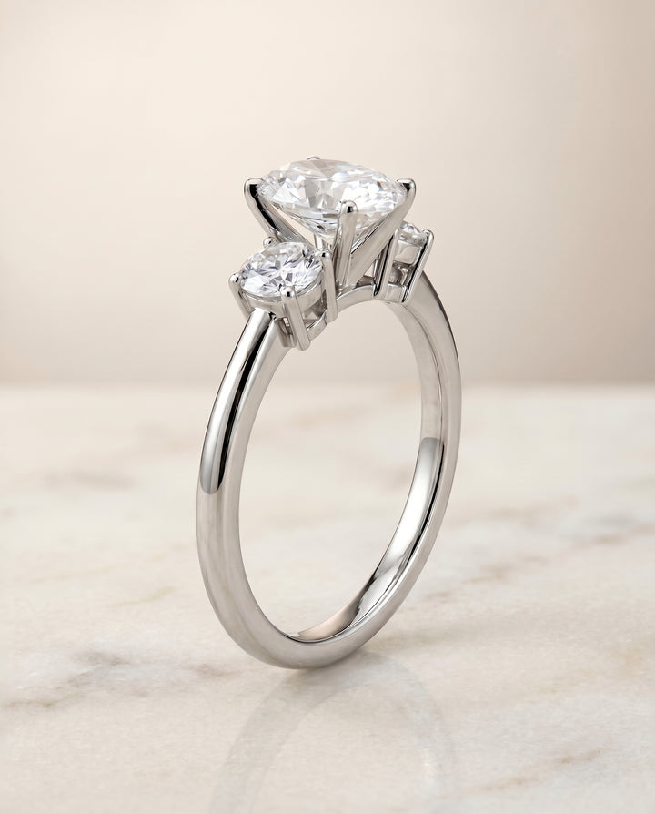 The Anita Three Stone Engagement Ring Setting for Oval Diamonds in 18K White Gold