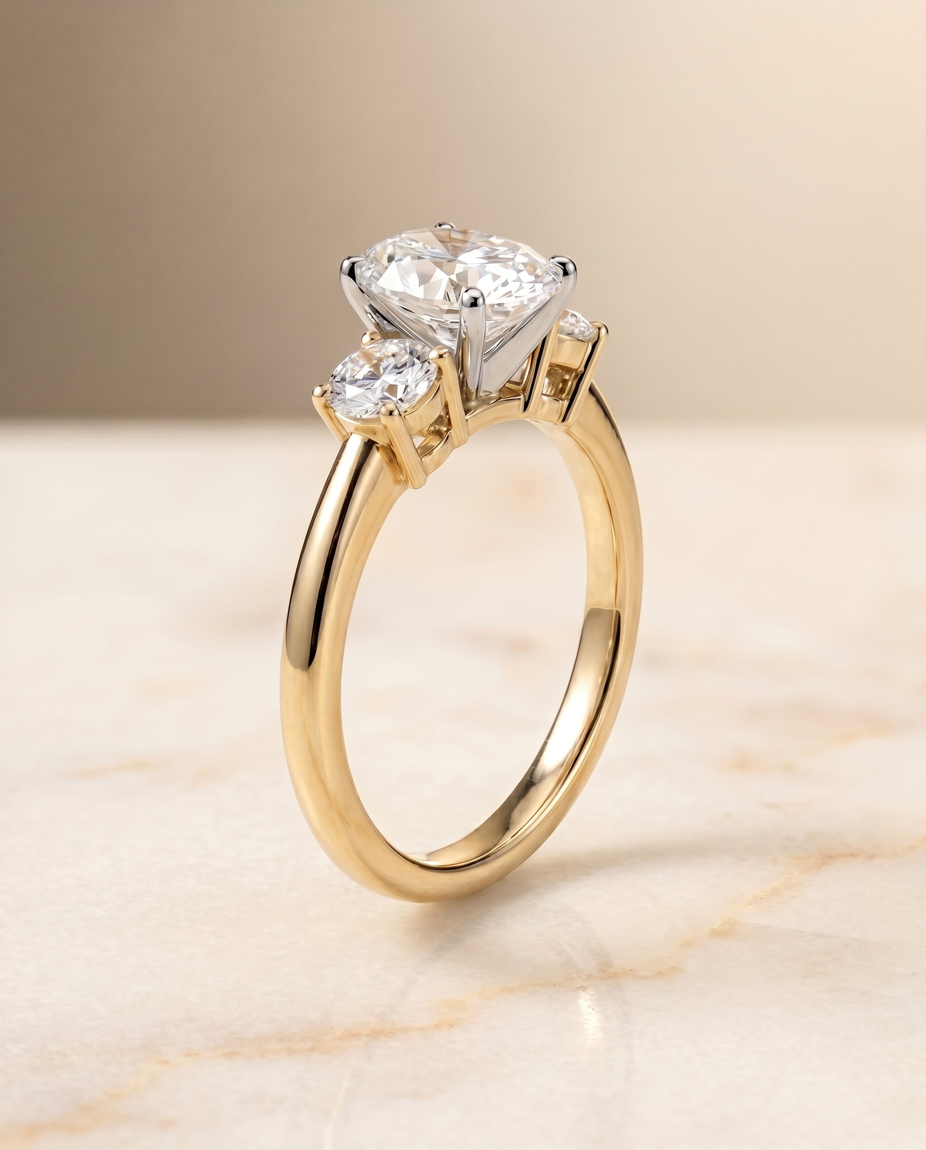 Anita Select Classic Three Stone Oval Lab Diamond Engagement Ring in 18K Yellow Gold, front view | RockHer