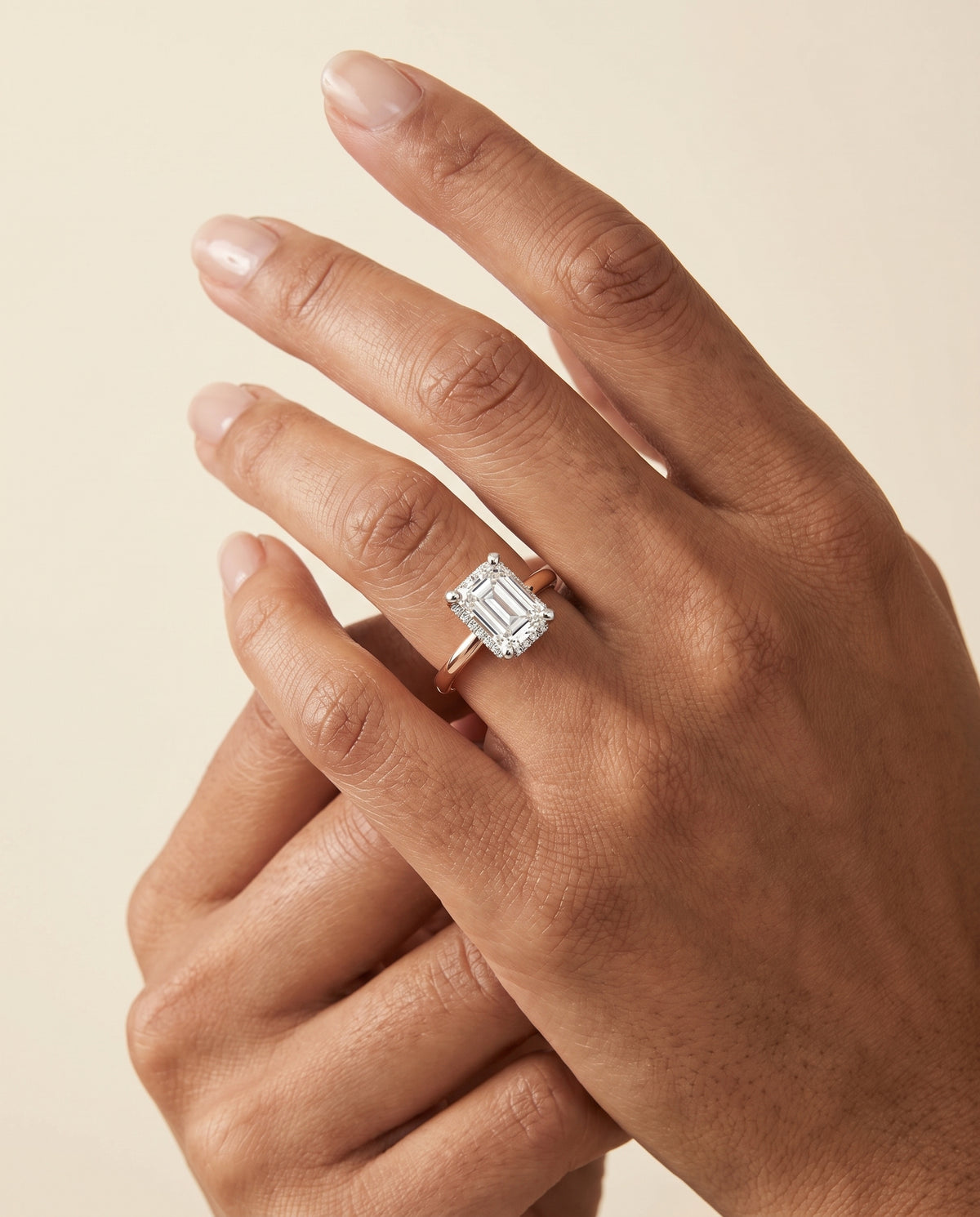 The Annabelle Hidden Pavé Basket Crown Solitaire Emerald Cut Engagement Ring Setting in 14K Rose Gold