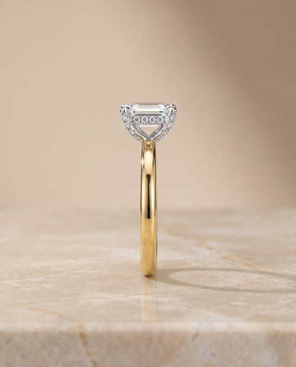 The Annabelle Hidden Pavé Basket Crown Solitaire Emerald Cut Engagement Ring Setting in 18K Yellow Gold