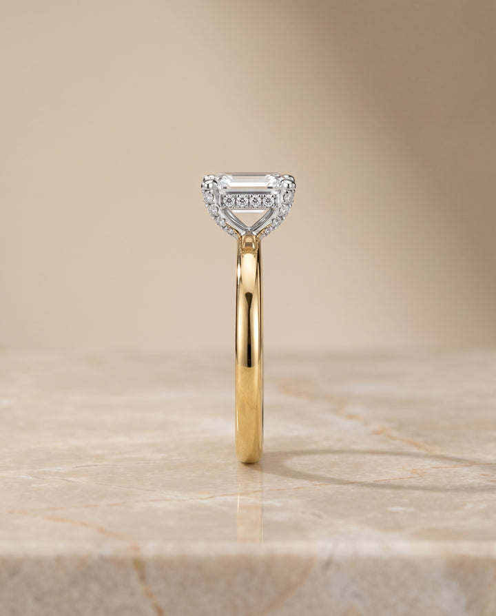 The Annabelle Hidden Pavé Basket Crown Solitaire Emerald Cut Engagement Ring Setting in 18K Yellow Gold