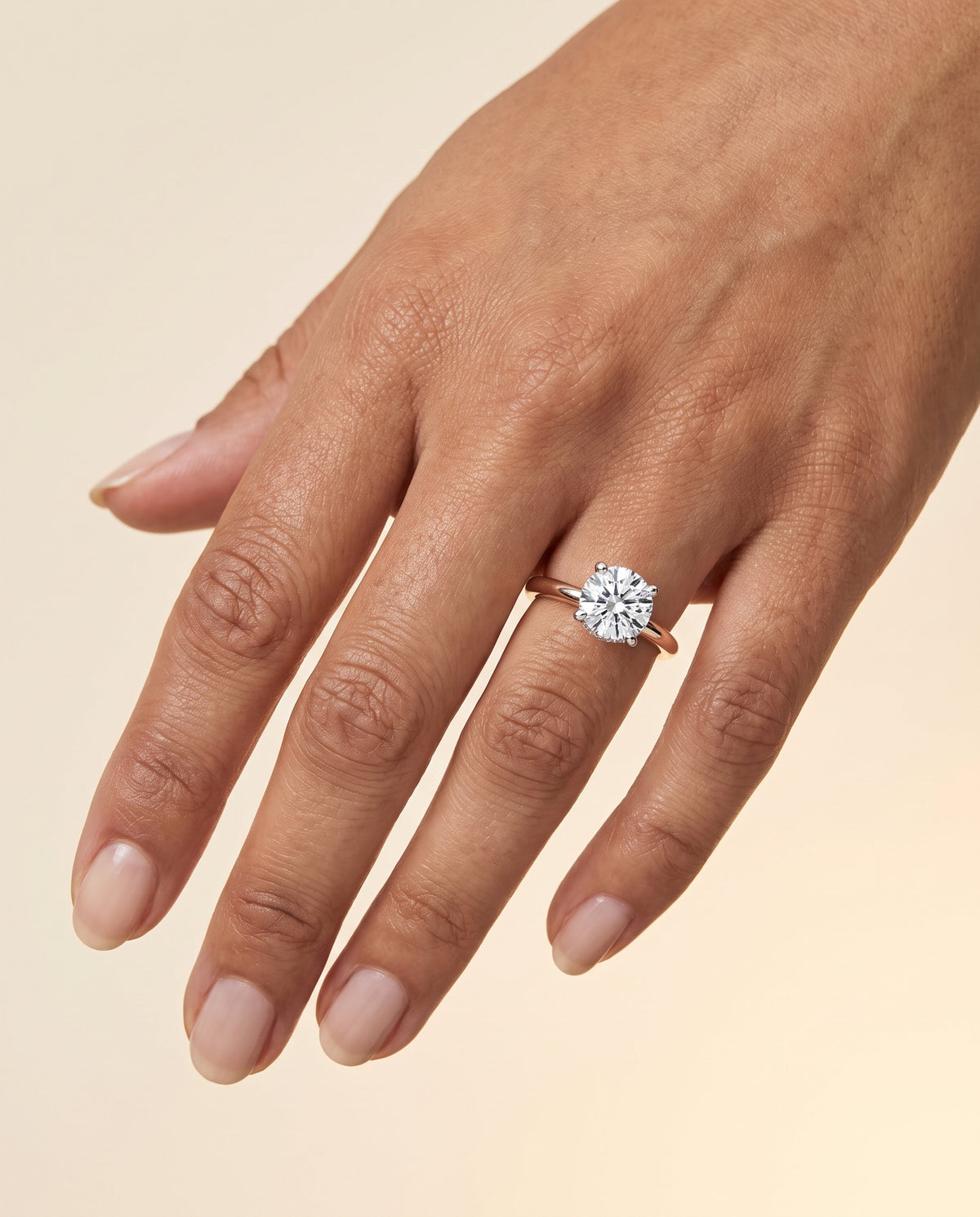 The Annabelle Hidden Pavé Basket Crown Solitaire Round Engagement Ring Setting in 14K Rose Gold