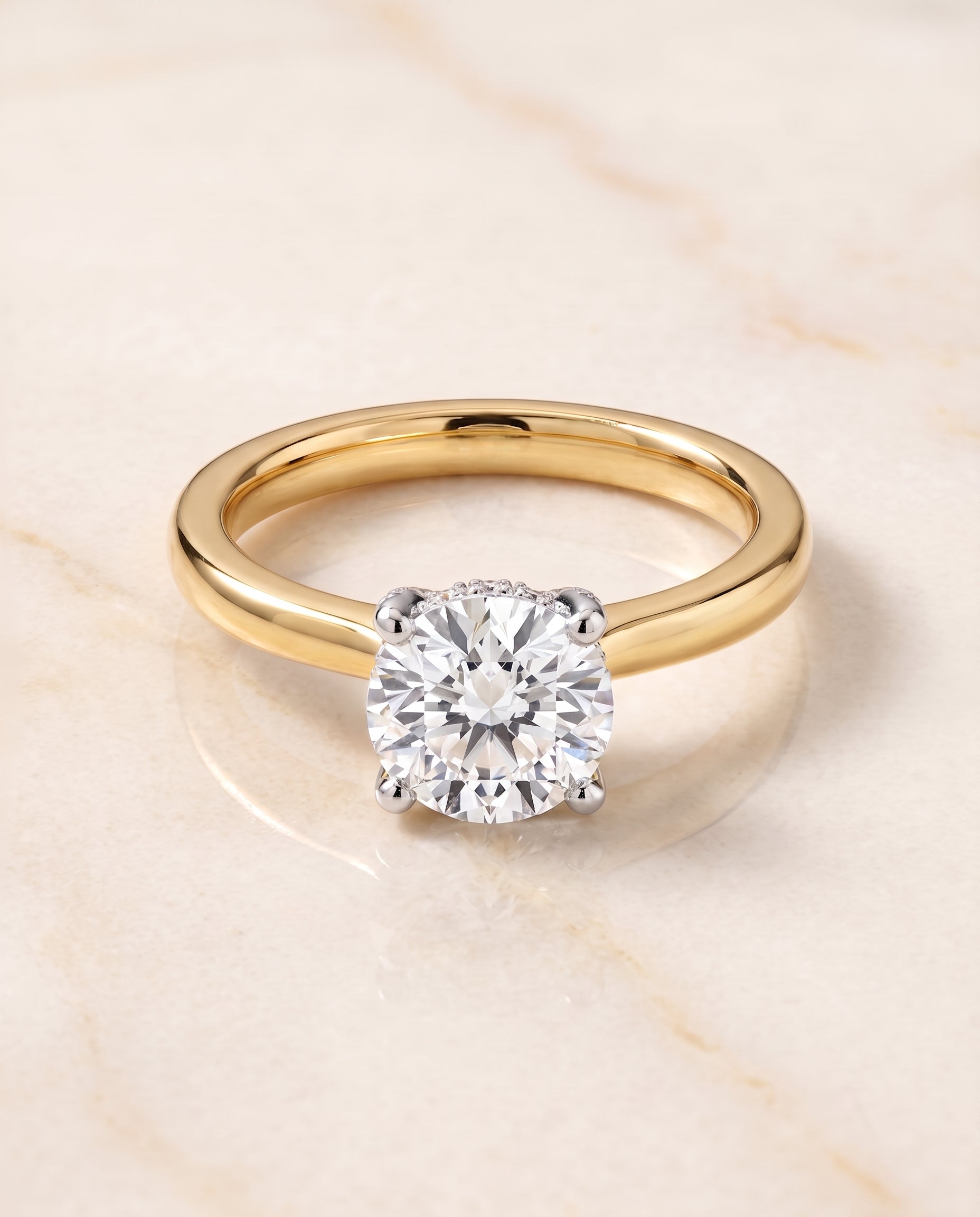 The Annabelle Hidden Pavé Basket Crown Solitaire Round Engagement Ring Setting in 18K Yellow Gold