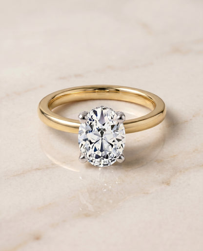 The Annabelle Hidden Pavé Basket Crown Solitaire Oval Engagement Ring Setting in 18K Yellow Gold