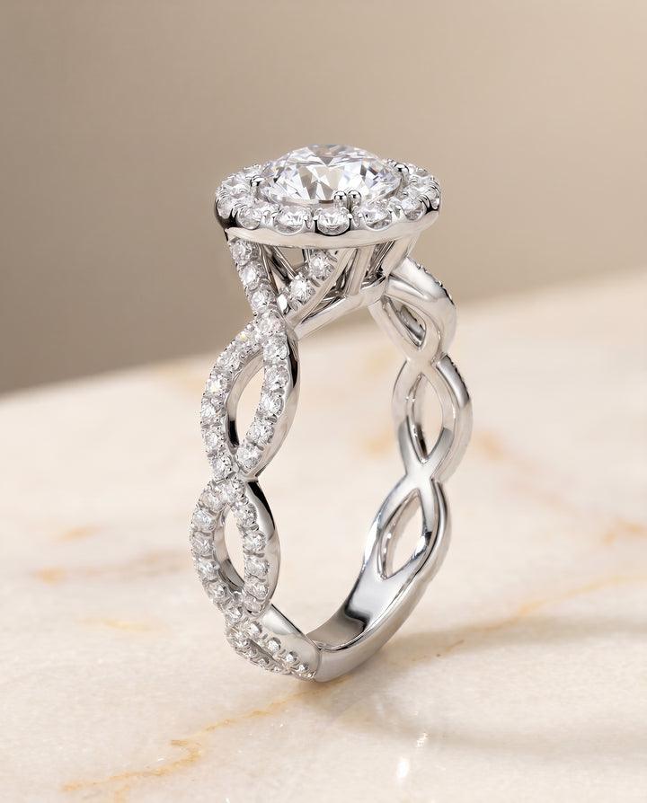 The Annie Twisted Pavé Halo Engagement Ring Setting for Round Diamonds in Platinum