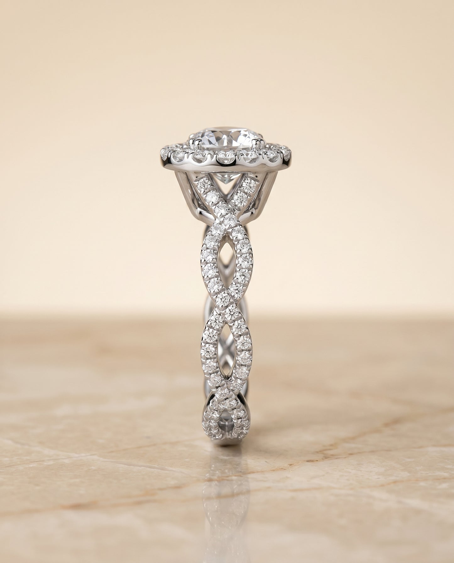 The Annie Twisted Pavé Halo Engagement Ring Setting for Round Diamonds in Platinum
