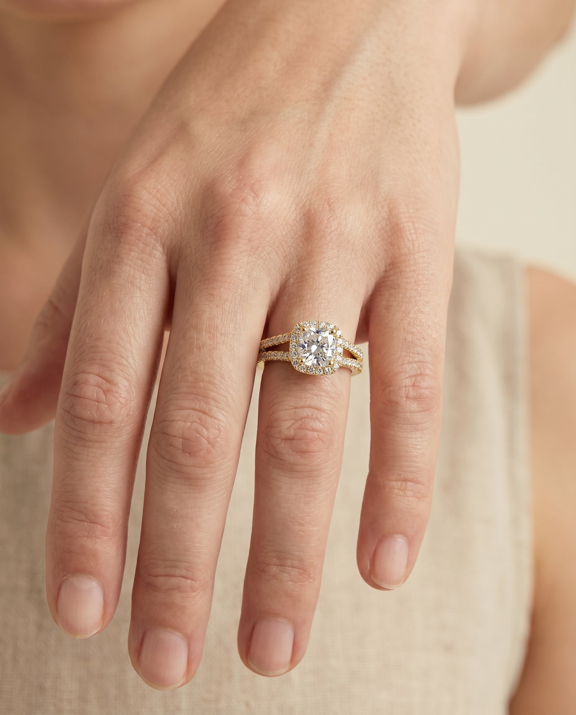 The Aretha engagement ring setting in 18K Yellow Gold, split shank pavé halo cut design | RockHer