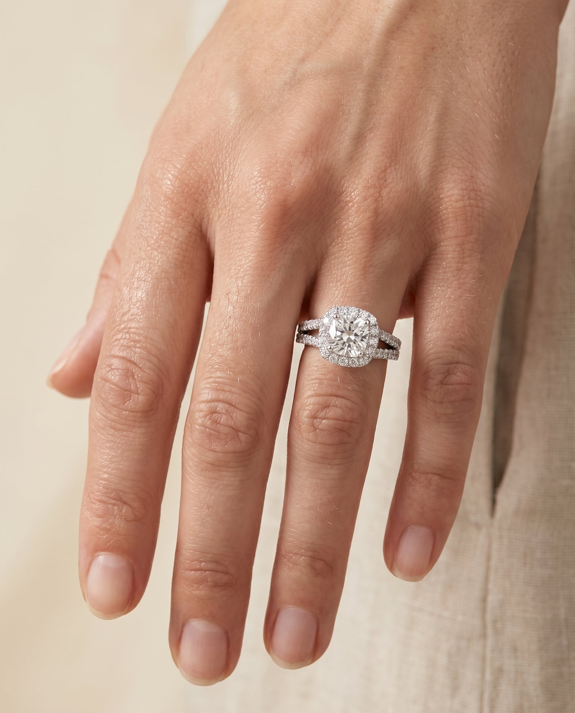 The Aretha engagement ring setting in Platinum, split shank pavé halo cut design | RockHer