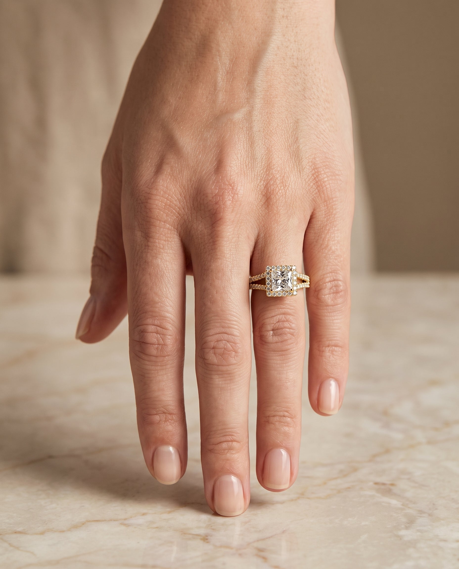 The Aretha engagement ring setting in 18K Yellow Gold, split shank pavé halo design | RockHer