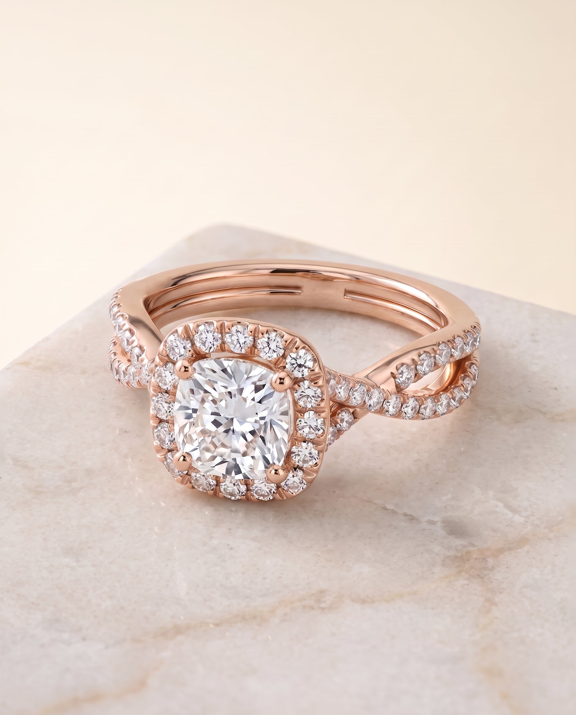 The Audra Twisted Scalloped Pavé Halo Cushion Cut Engagement Ring Setting in 14K Rose Gold