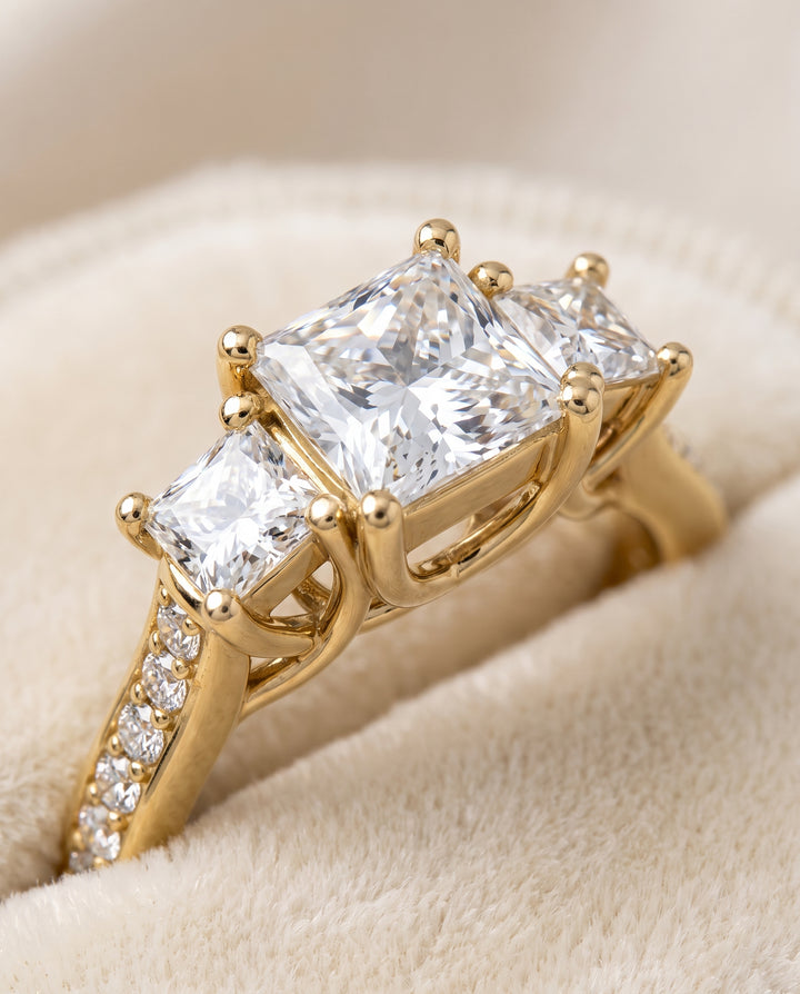 The Avery Channel Pavé Three Stone Princess Cut Engagement Ring Setting in 18K Yellow Gold