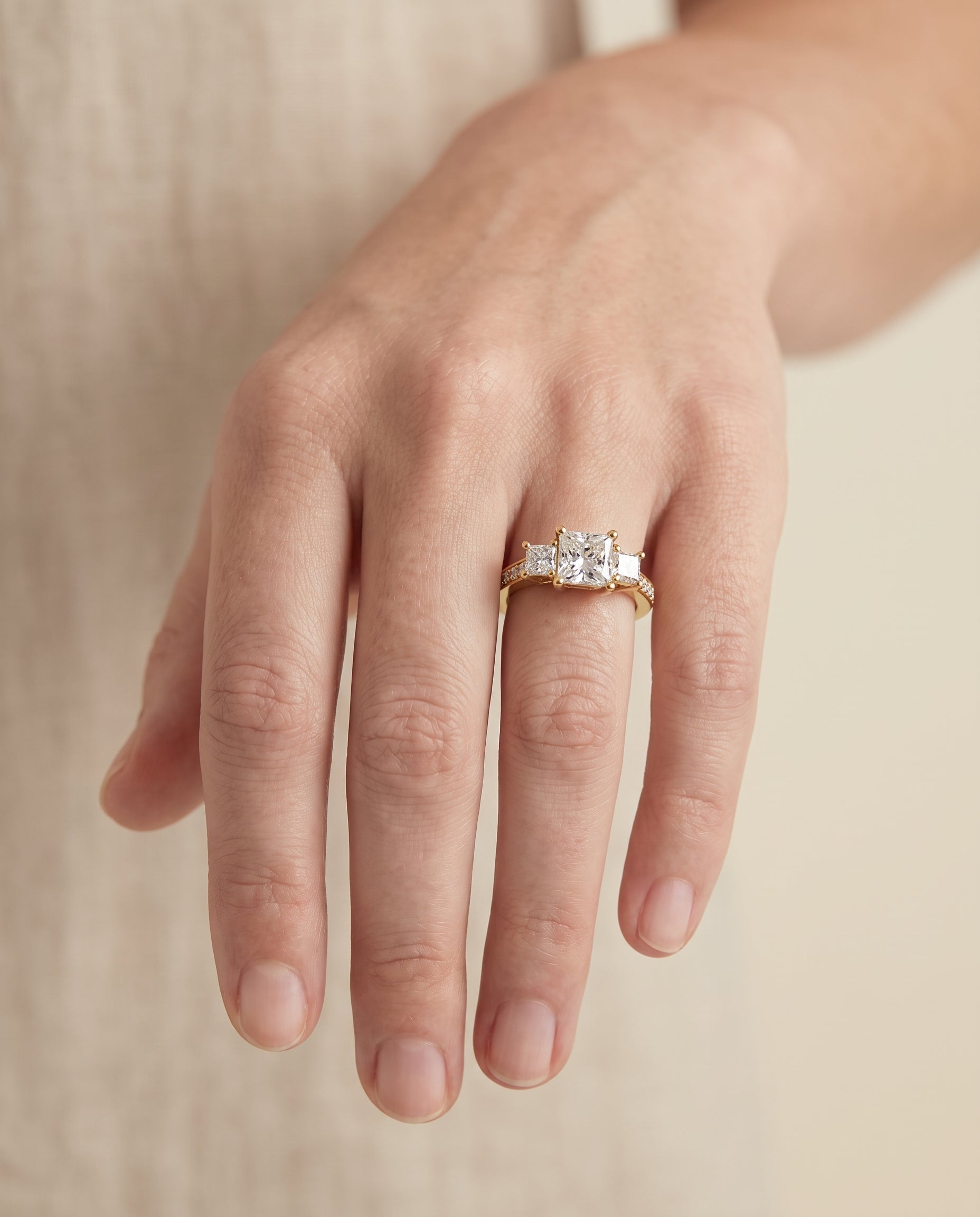 The Avery engagement ring setting in 18K Yellow Gold, channel pavé three stone design | RockHer