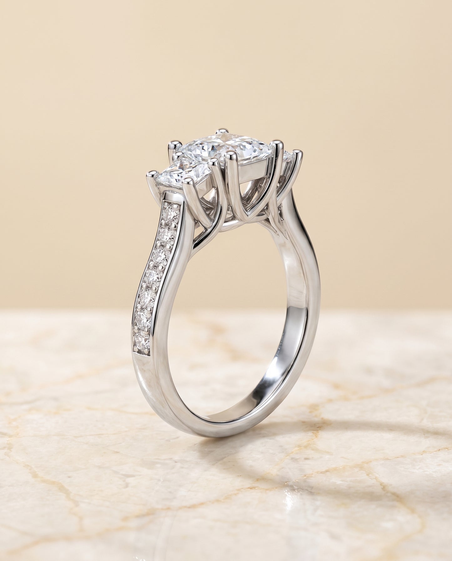 The Avery Channel Pavé Three Stone Princess Cut Engagement Ring Setting in Platinum