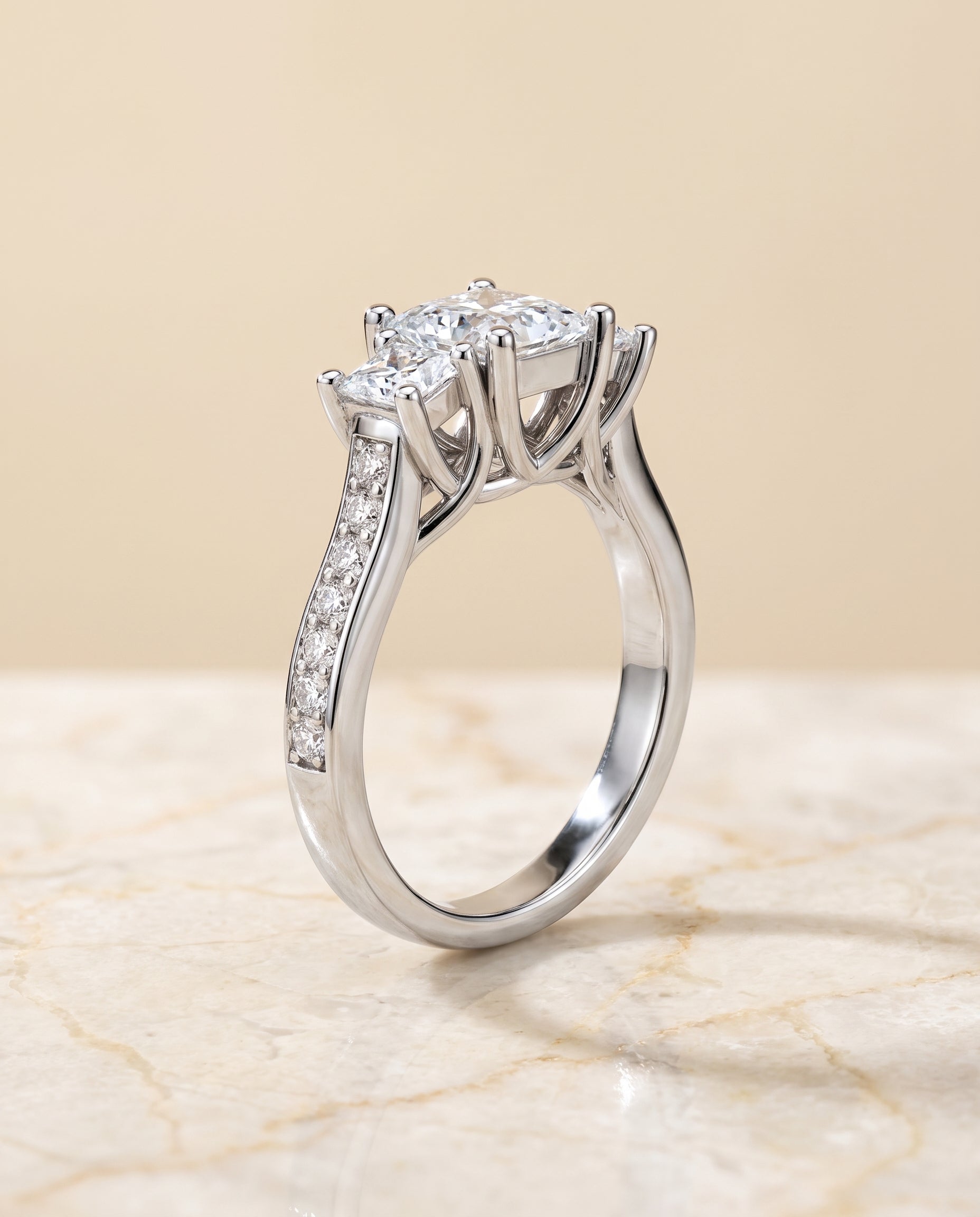 The Avery Channel Pavé Three Stone Princess Cut Engagement Ring Setting in Platinum