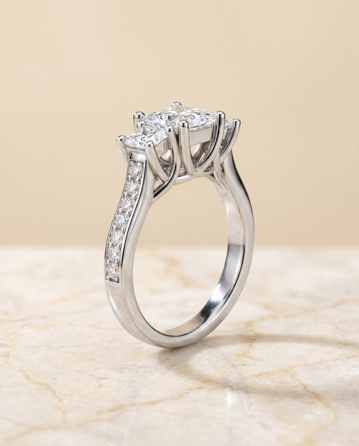 The Avery Channel Pavé Three Stone Princess Cut Engagement Ring Setting in Platinum