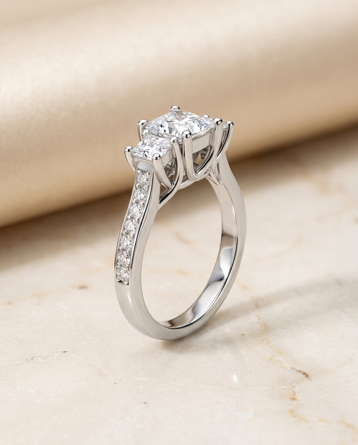 The Avery Channel Pavé Three Stone Princess Cut Engagement Ring Setting in 18K White Gold