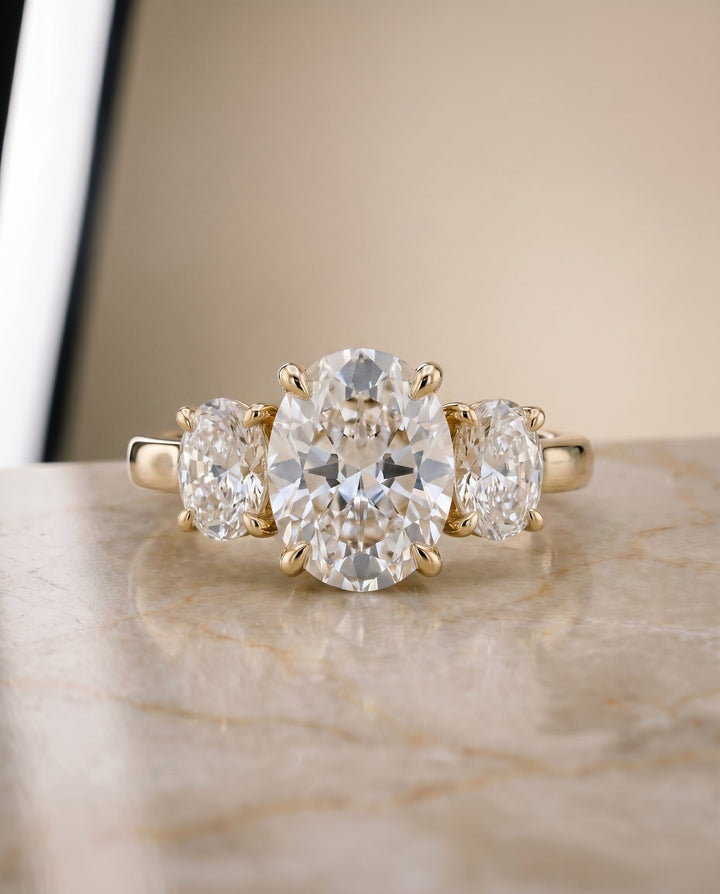 Avery Select Three Stone Round Lab Diamond Engagement Ring in 18K Yellow Gold, side view | RockHer