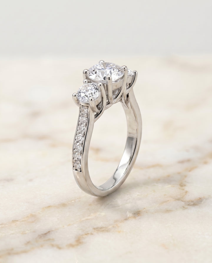 The Avery Three Stone Engagement Ring Setting for Round Diamonds in Platinum