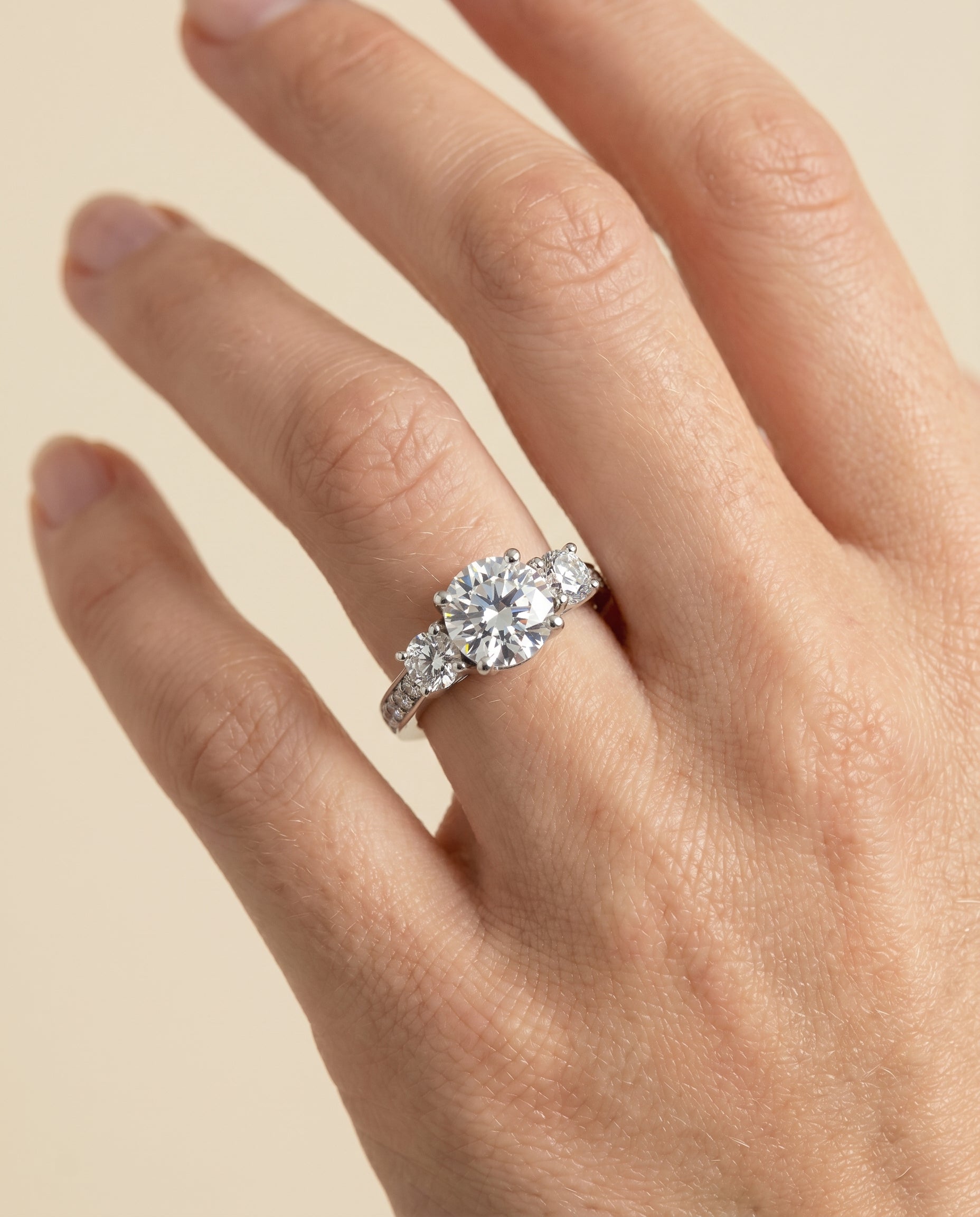 The Avery engagement ring setting in Platinum, channel pavé three stone design | RockHer
