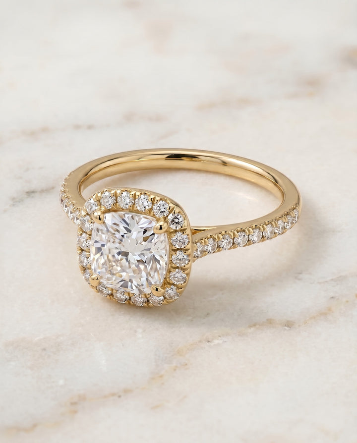 Bianca Select Halo Cushion Cut Lab Diamond Engagement Ring in 18K Yellow Gold, shown on hand, angled | RockHer