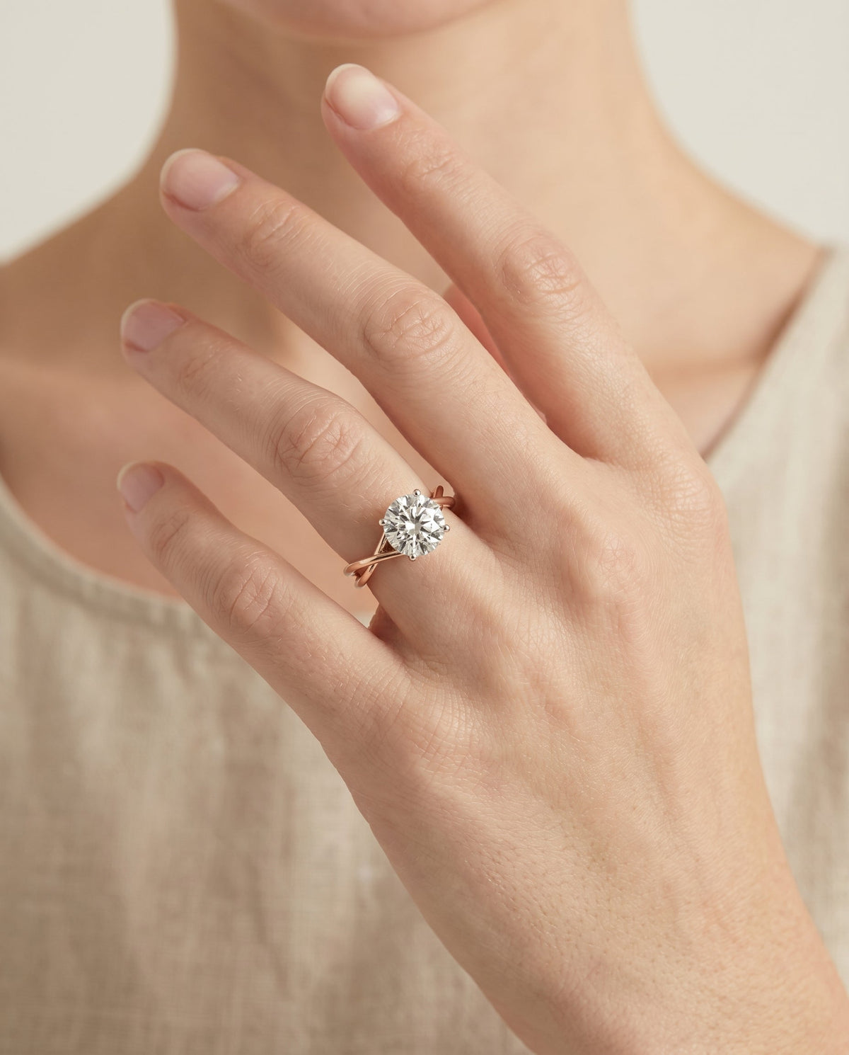 Blondie Select Double Hidden Halo Solitaire Round Lab Diamond Engagement Ring in 14K Rose Gold, shown on hand | RockHer
