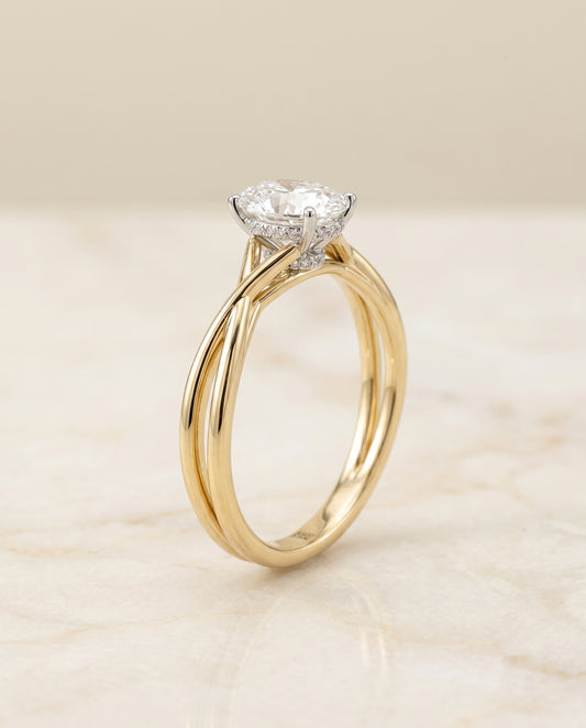 The Blondie Twisted Hidden Halo Solitaire Engagement Ring Setting for Oval Diamonds in 18K Yellow Gold | RockHer