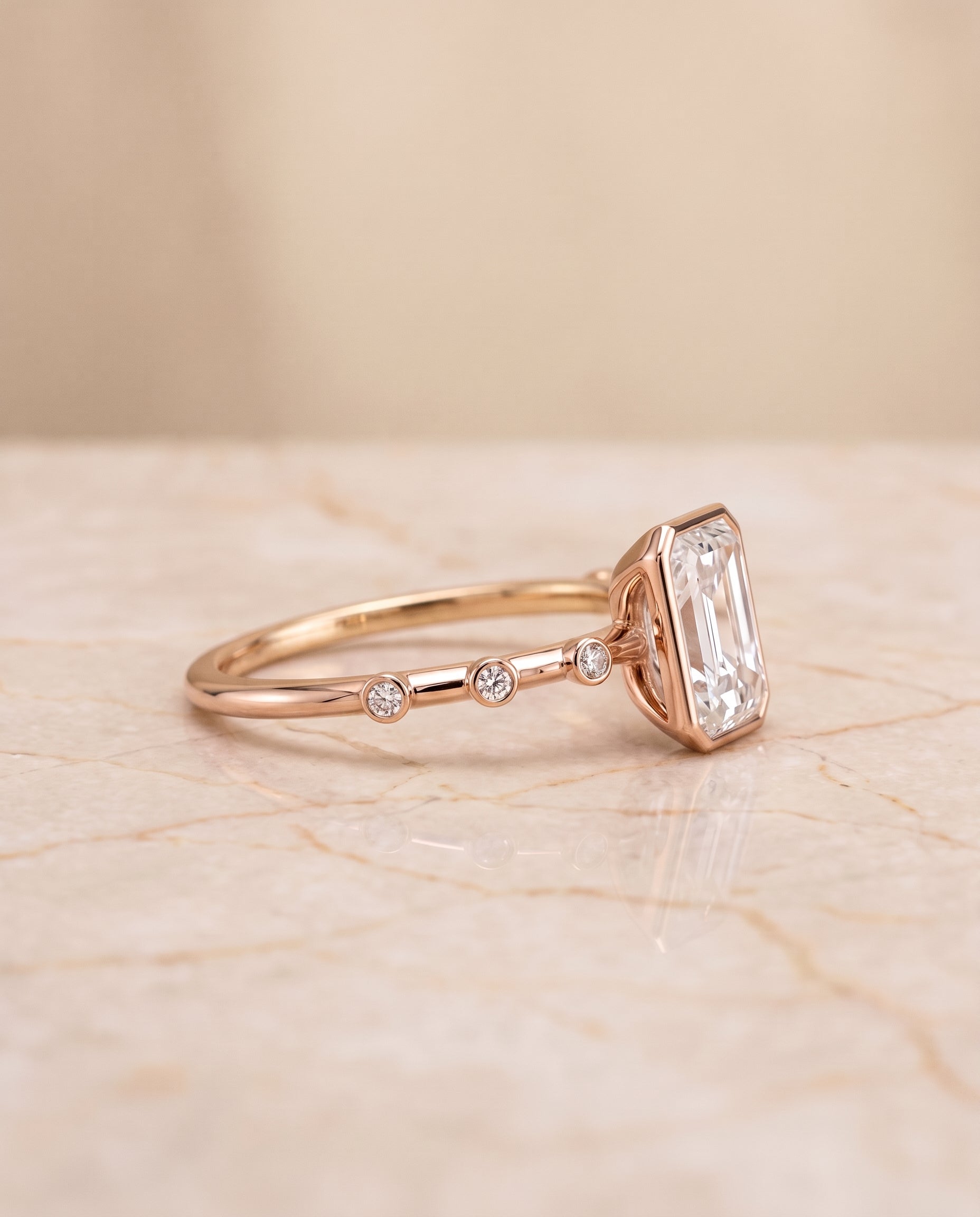 The Brandi Bezel Accent Solitaire Radiant Cut Engagement Ring Setting in 14K Rose Gold