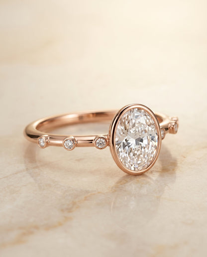 Brandi Select Solitaire Oval Lab Diamond Engagement Ring in 14K Rose Gold, shown on hand, angled | RockHer