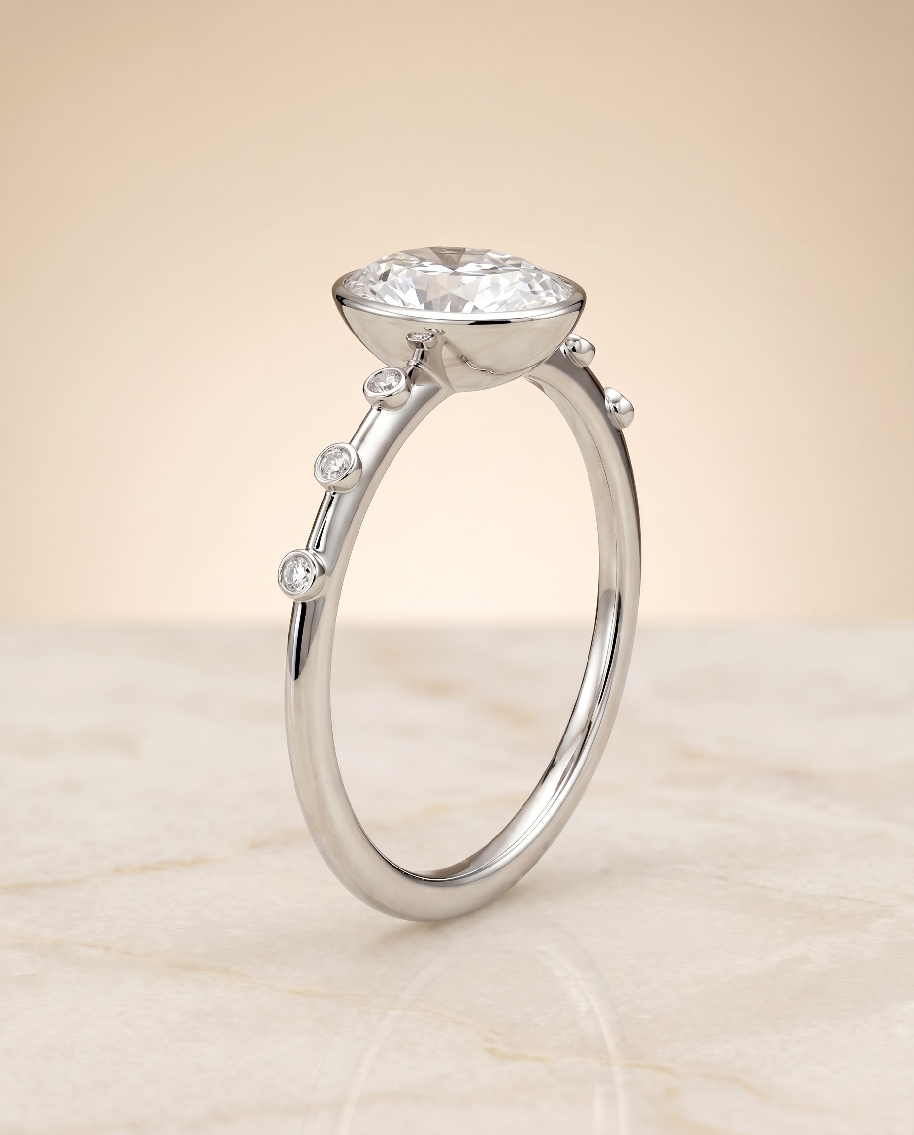 Bezel Accent Solitaire styling on The Brandi oval engagement ring setting | RockHer