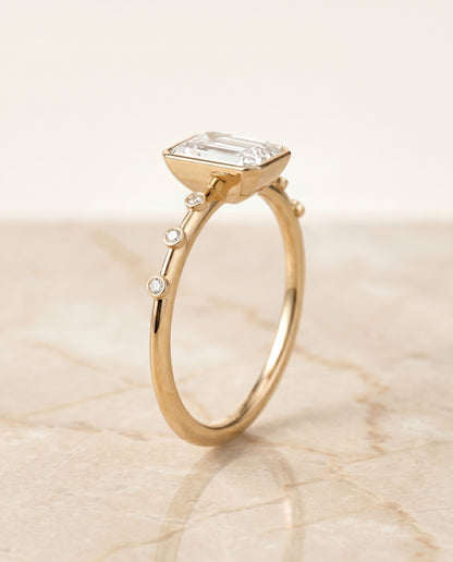 The Brandi Bezel Accent Solitaire Radiant Cut Engagement Ring Setting in 18K Yellow Gold