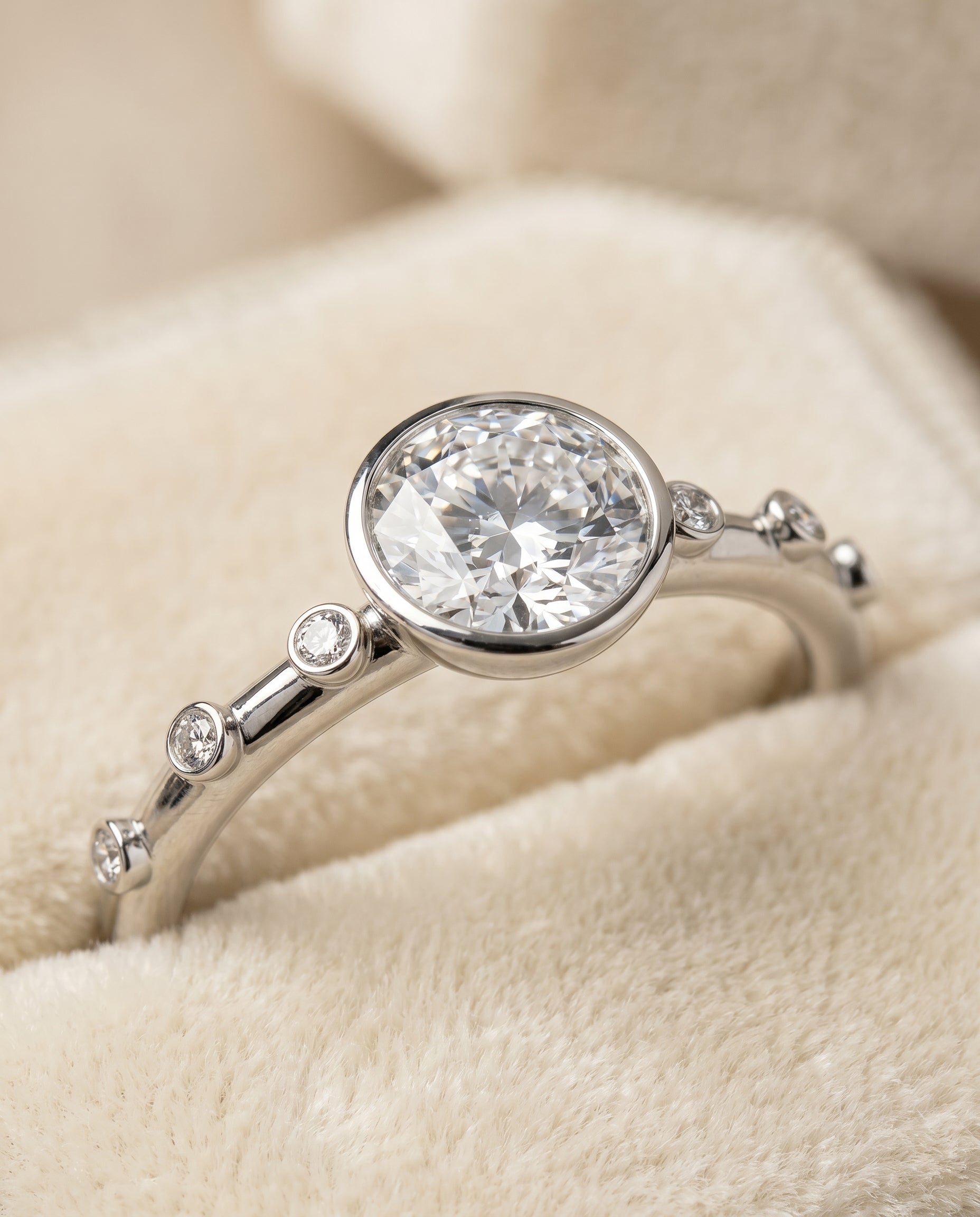 Brandi Select Bezel Accent Solitaire Round Lab Diamond Engagement Ring in 18K White Gold, detail view | RockHer