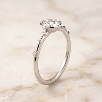 The Brandi Bezel Accent Solitaire Round Engagement Ring Setting in Platinum