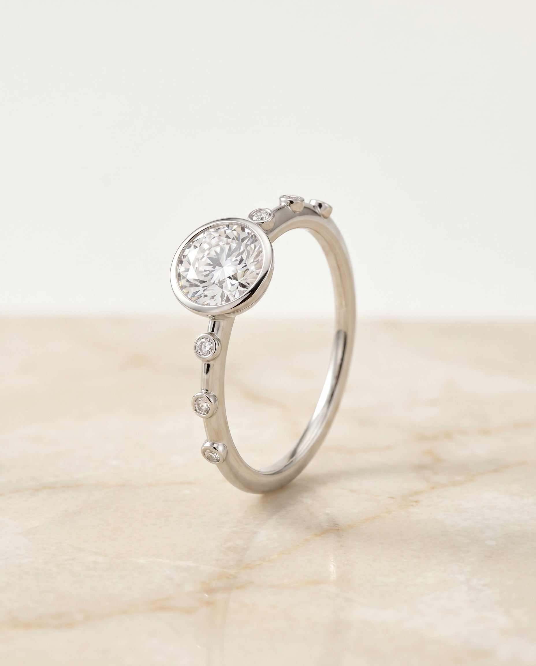 Bezel Accent Solitaire styling on The Brandi round engagement ring setting | RockHer