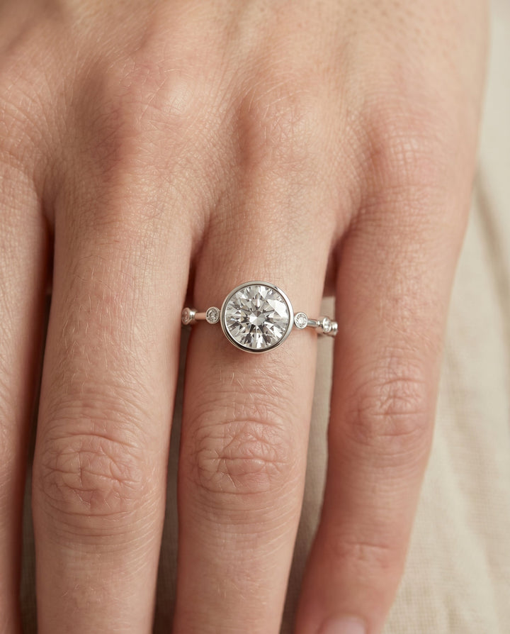 Brandi Select Bezel Accent Solitaire Emerald Cut in Platinum – view 3