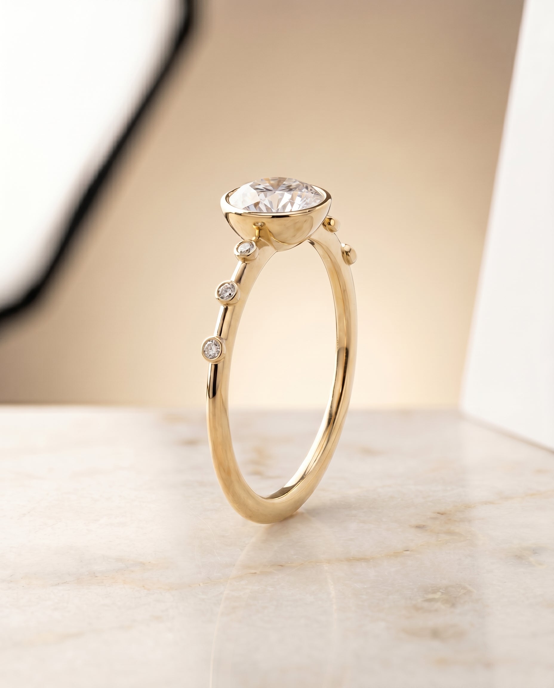 Bezel Accent Solitaire styling on The Brandi round engagement ring setting | RockHer