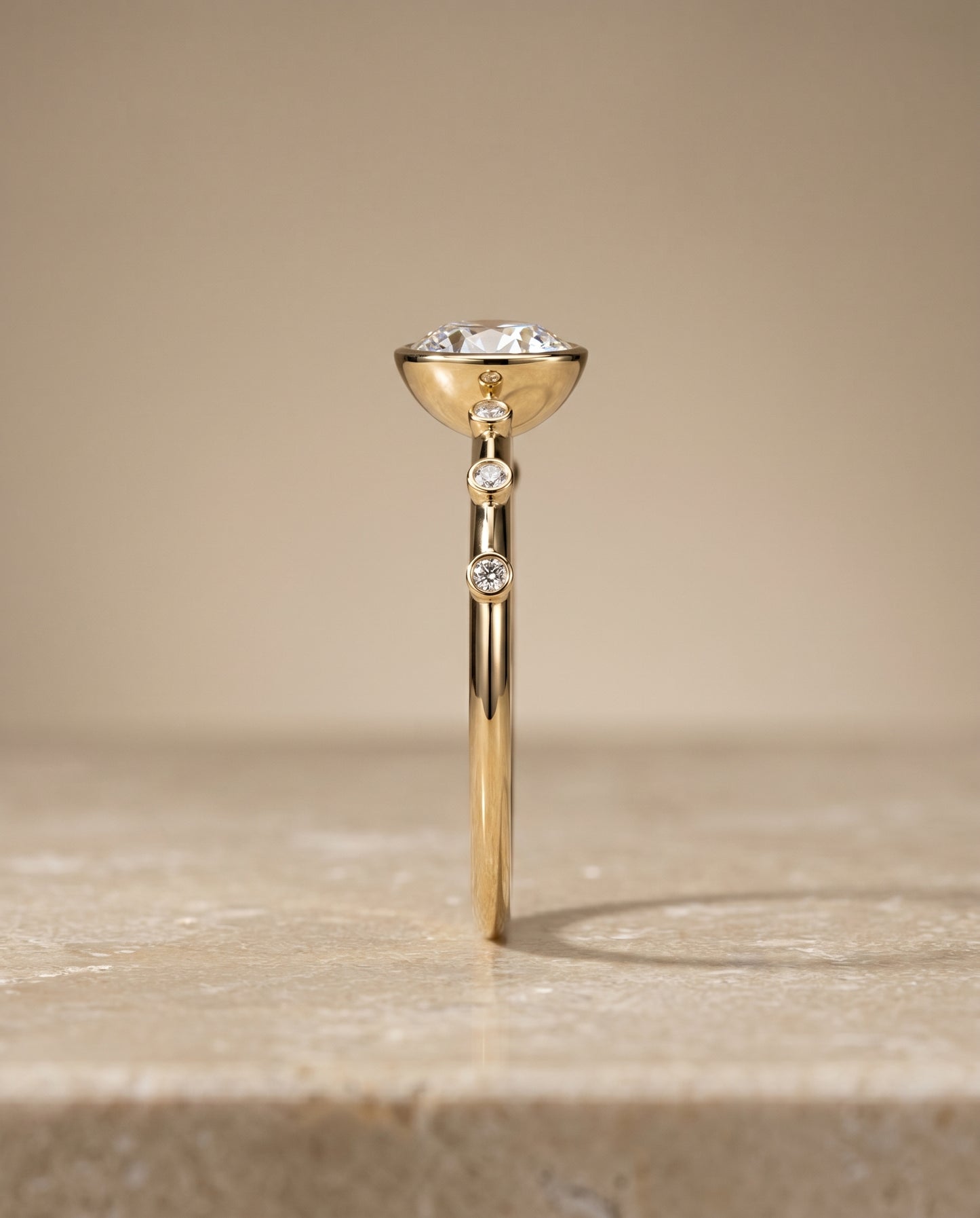 The Brandi Bezel Accent Solitaire Round Engagement Ring Setting in 18K Yellow Gold