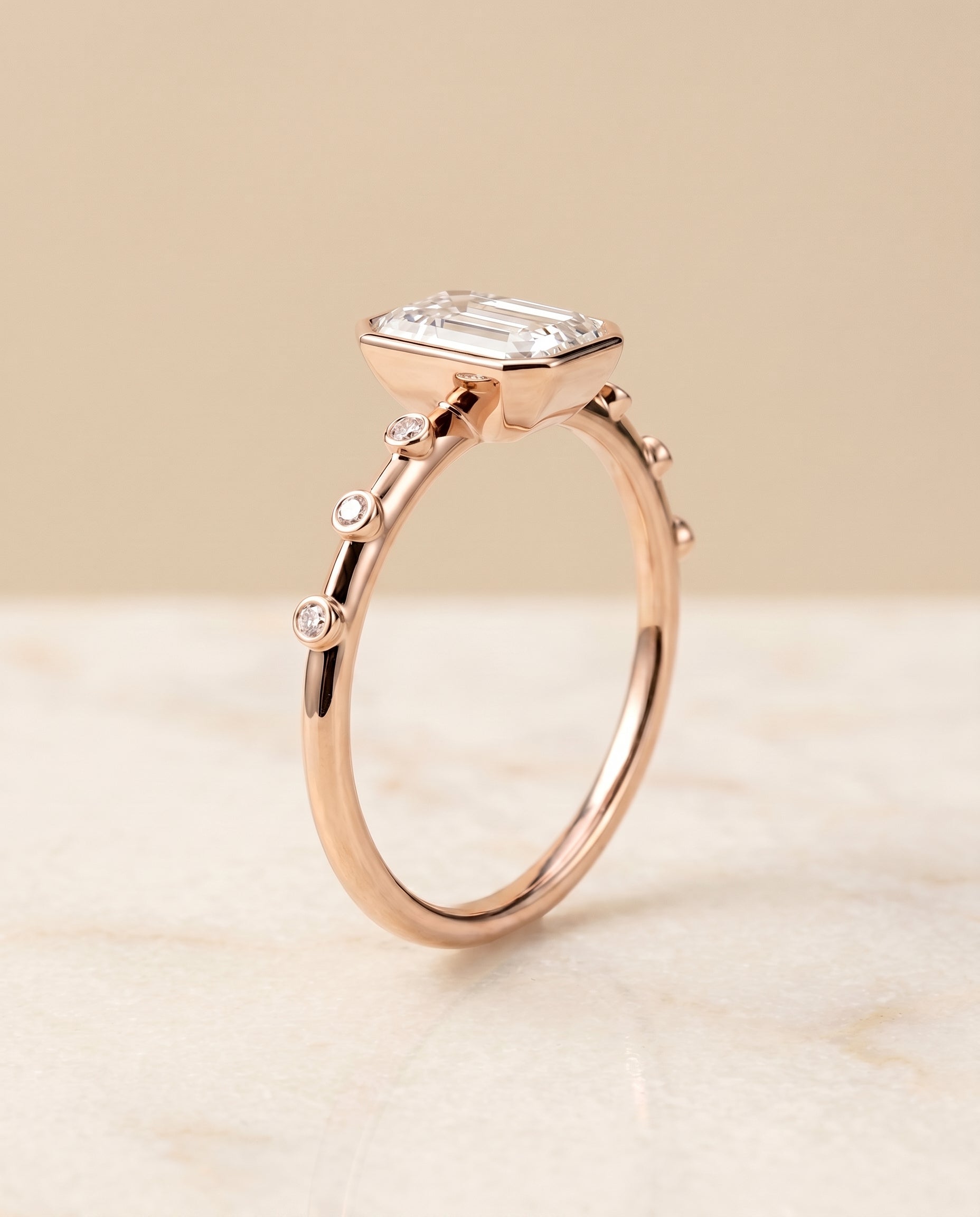 Bezel Accent Solitaire Cut styling on The Brandi emerald engagement ring setting | RockHer