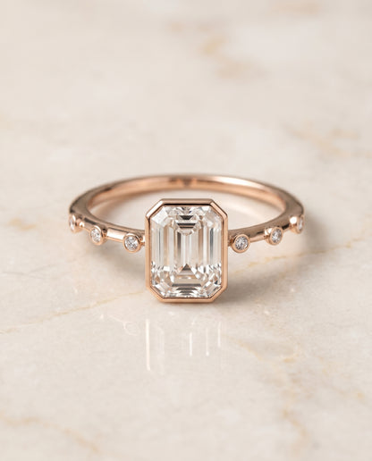The Brandi Bezel Accent Solitaire Emerald Cut Engagement Ring Setting in 14K Rose Gold
