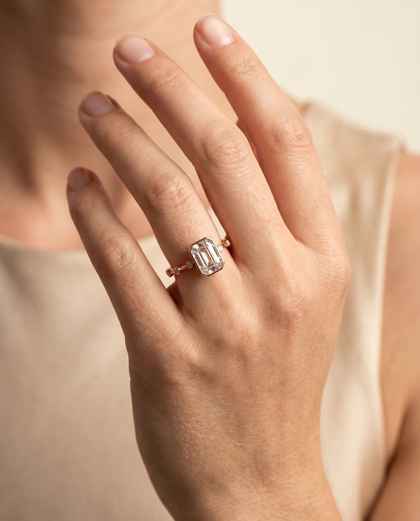 The Brandi Bezel Accent Solitaire Emerald Cut Engagement Ring Setting in 14K Rose Gold